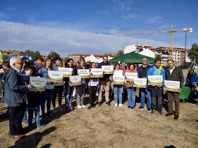 Riolobos y Gregorio durante la carrera solidaria este domingo en Talavera.