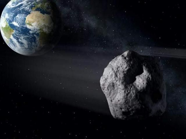 Imagen de la Tierra y un asteroide